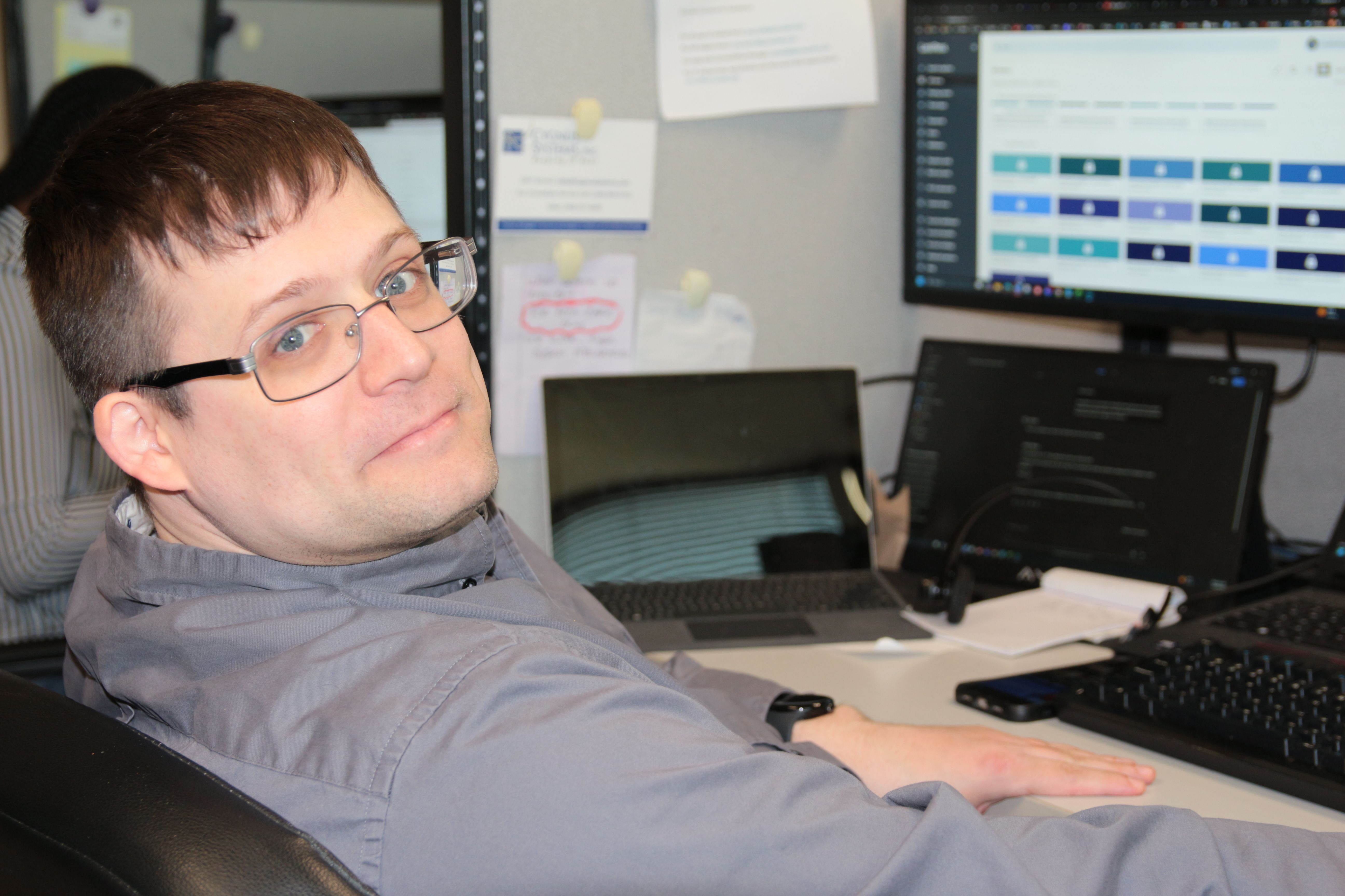 A Cygnus Systems technician at work in our Southeast Michigan support center